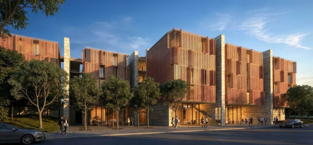 Modern hotel with decorative copper-toned perforated metal screens stone base trees and pedestrians