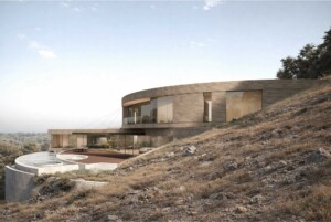 Modern curved hillside residence with stone cladding, large windows, terrace and infinity pool